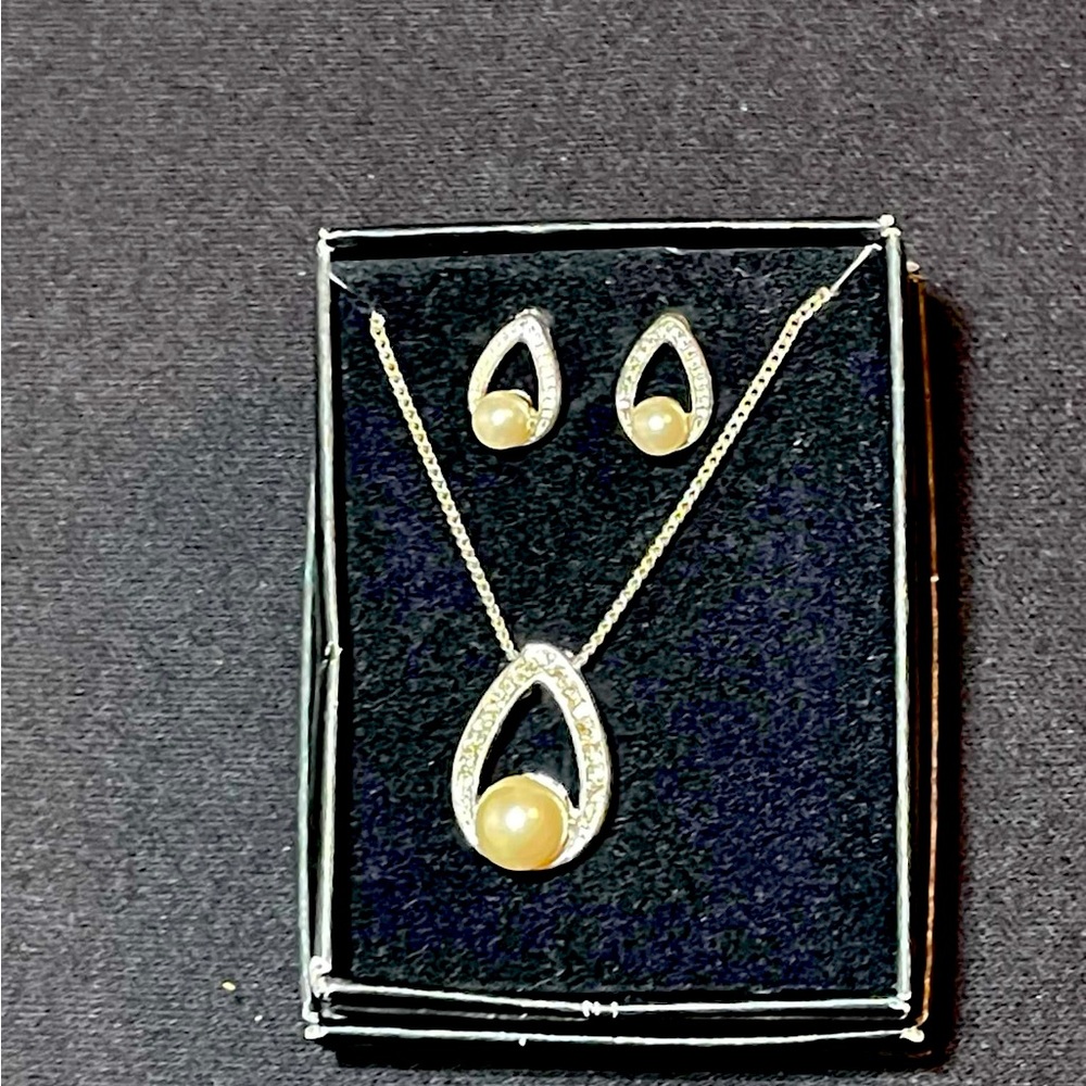 110 - Avon 3 pc Silvertone with faux pearl Necklace and earring